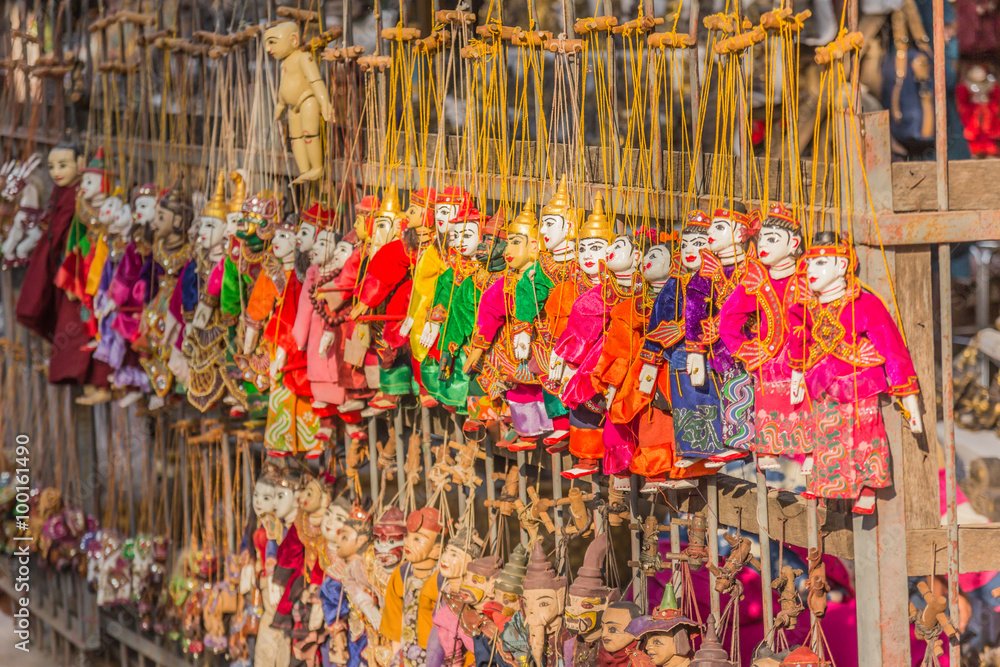 Traditional handicraft puppets are sold in a shop in Bagan, Myan