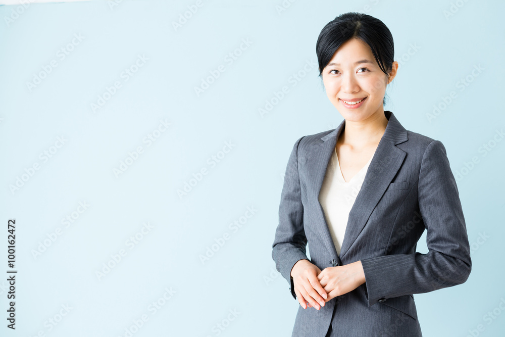 asian businesswoman isolated on blue background asian businesswoman isolated on blue background