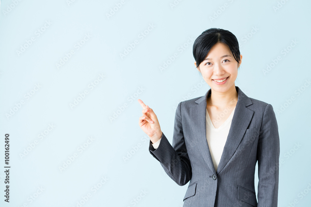 asian businesswoman isolated on blue background asian businesswoman isolated on blue background