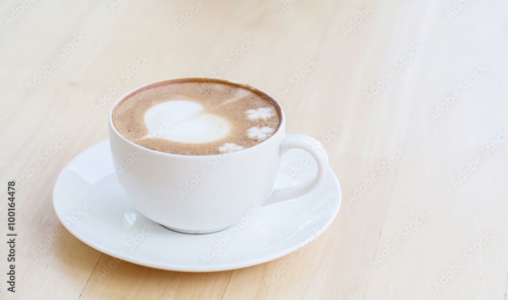 heart symbol on latte coffee cup on table heart symbol on latte coffee cup on table