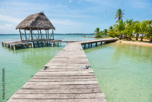 Long wooden walkway on the water of Caribbean sea on Bocas del Toro in Panama