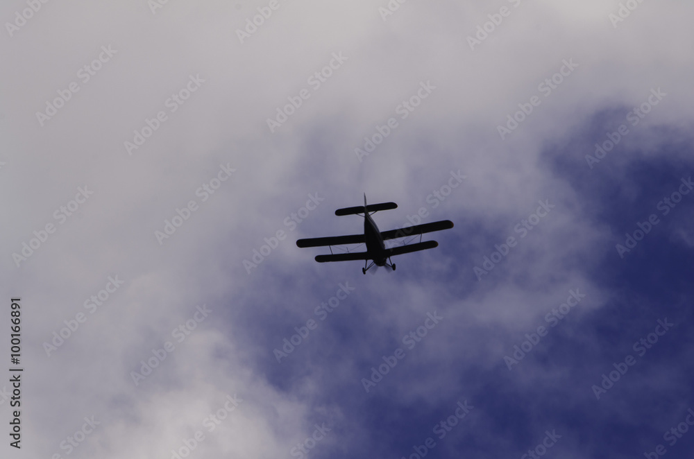 A small plane in the sky. Maize. A small plane in the sky. Maize.