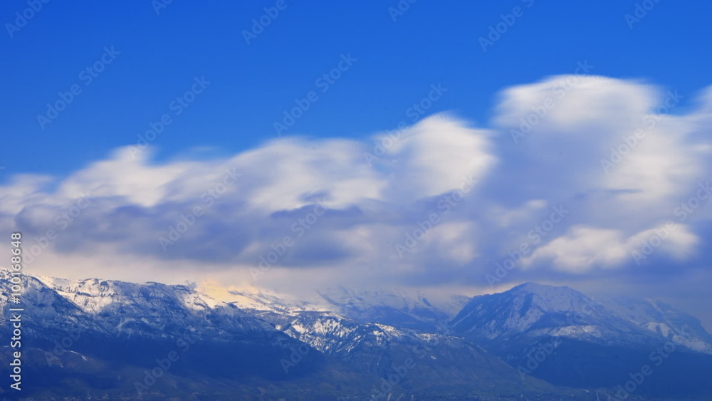 Time-lapse shot of snow-capped mountain peaks in Utah Time-lapse shot of snow-capped mountain peaks in Utah