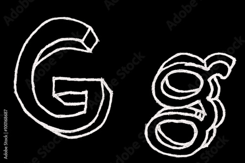 G - Chalc ABC letters over black background photo