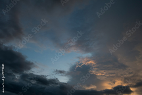 twilight sunset sky with cloudy and sunlight through clouds