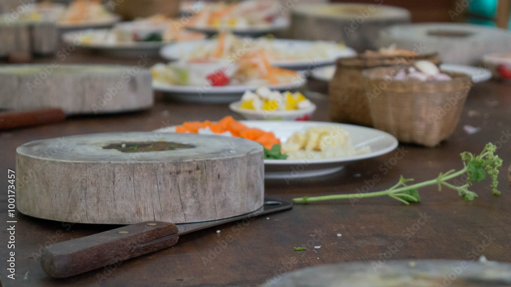 Wooden cutting block and healthy ingredients for an asian meal Wooden cutting block and healthy ingredients for an asian meal