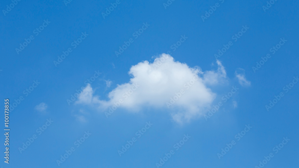 single cloud on clear blue sky with copy space for create text single cloud on clear blue sky with copy space for create text