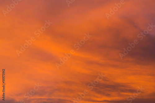 colorful dramatic sunset sky with orange cloud, twilight sky © sutichak