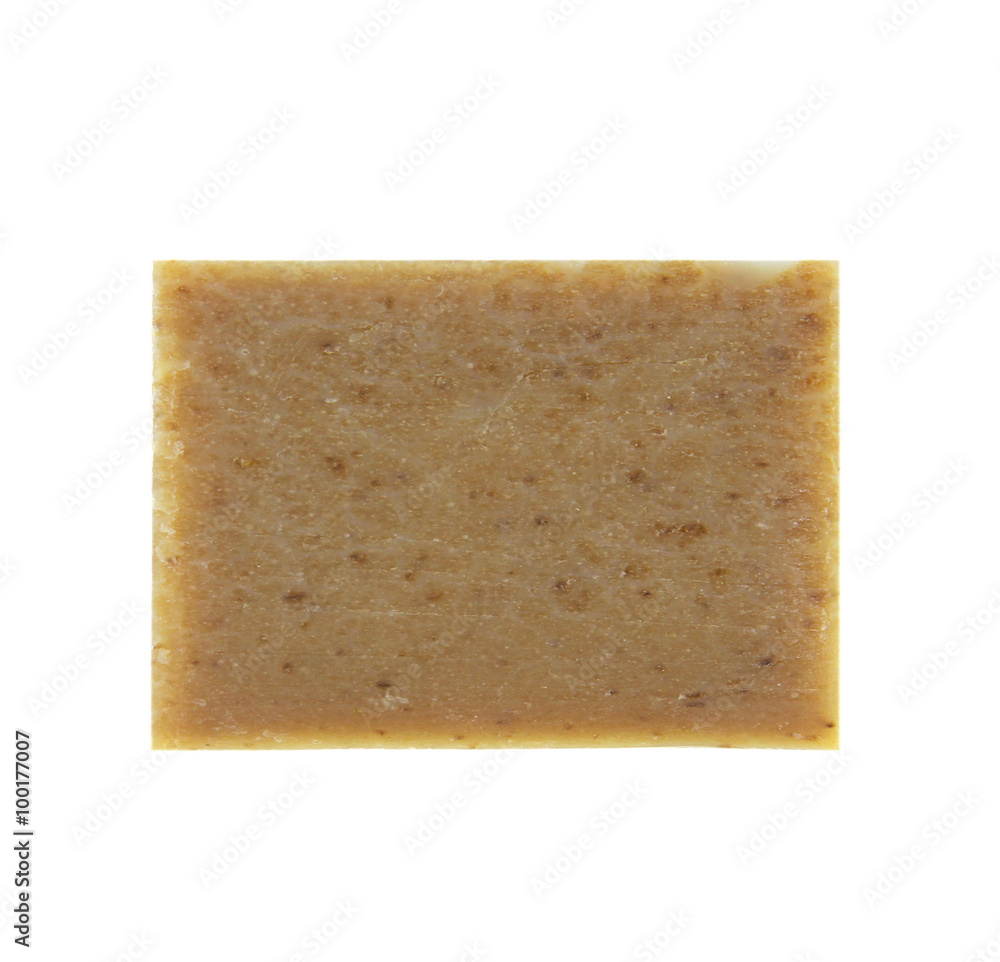bars of natural soap with dried herbs isolated on white background