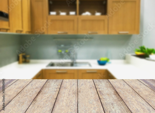 Wooden table on modern kitchen interior background