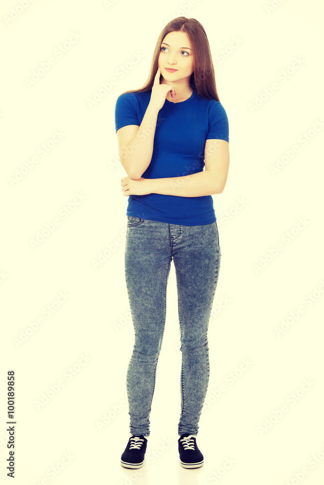 Fototapeta premium Beautiful thoughtful woman looking up.