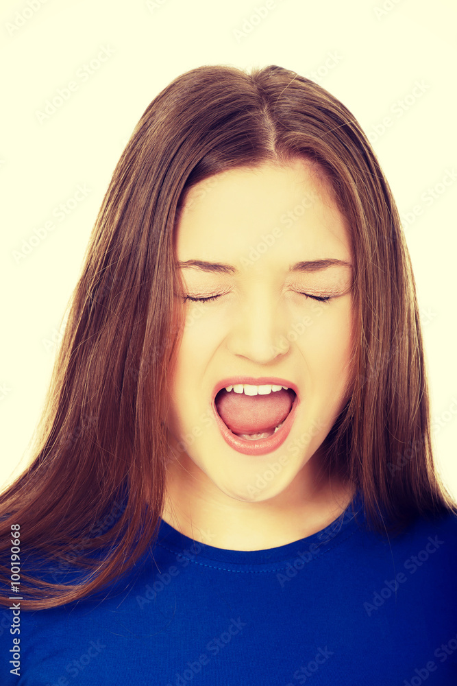 Frustrated young woman screaming. Frustrated young woman screaming.
