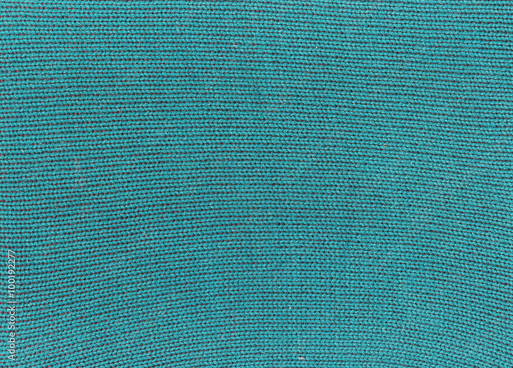 Green knitted material texture. Green knitted material texture.