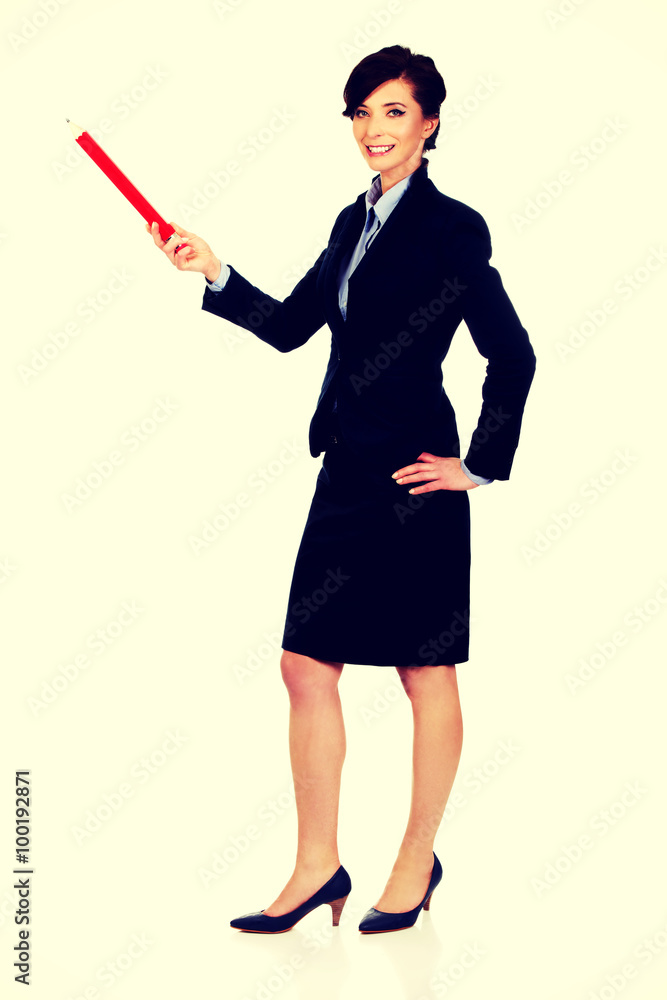 Businesswoman pointing up with pencil. Businesswoman pointing up with pencil.