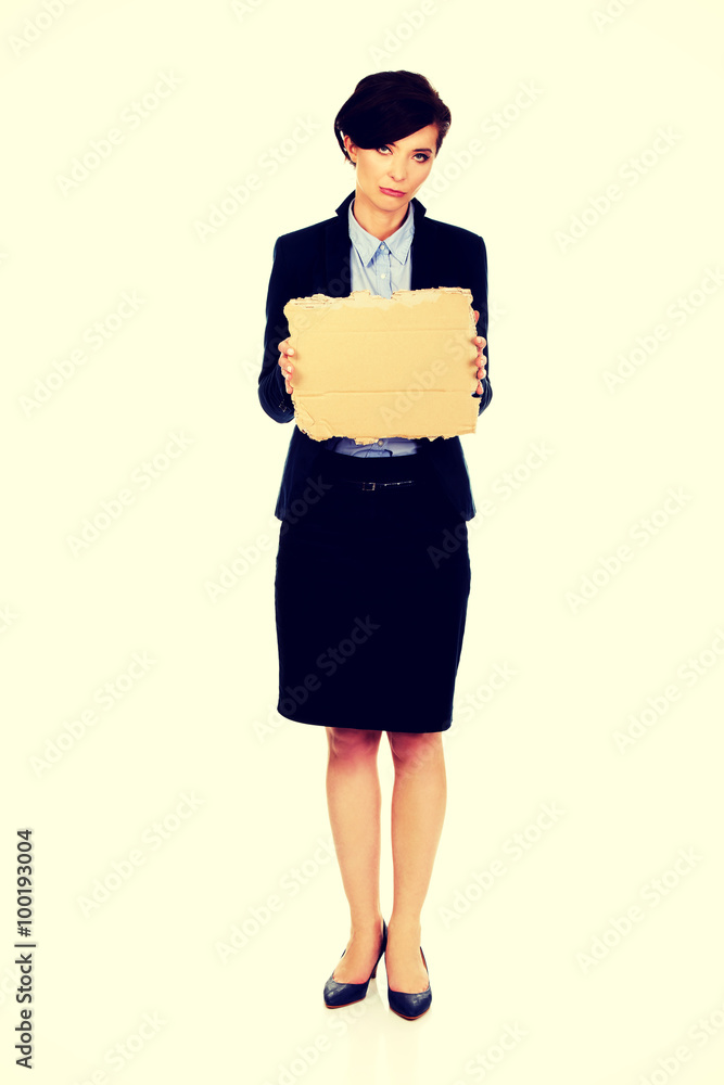 Fired businesswoman with a cardboard. Fired businesswoman with a cardboard.