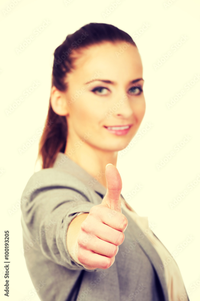 Smiling businesswoman with thumbs up. Smiling businesswoman with thumbs up.