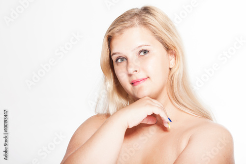 Beautiful fat woman in white underwear isolated on white in studio. Plus size.