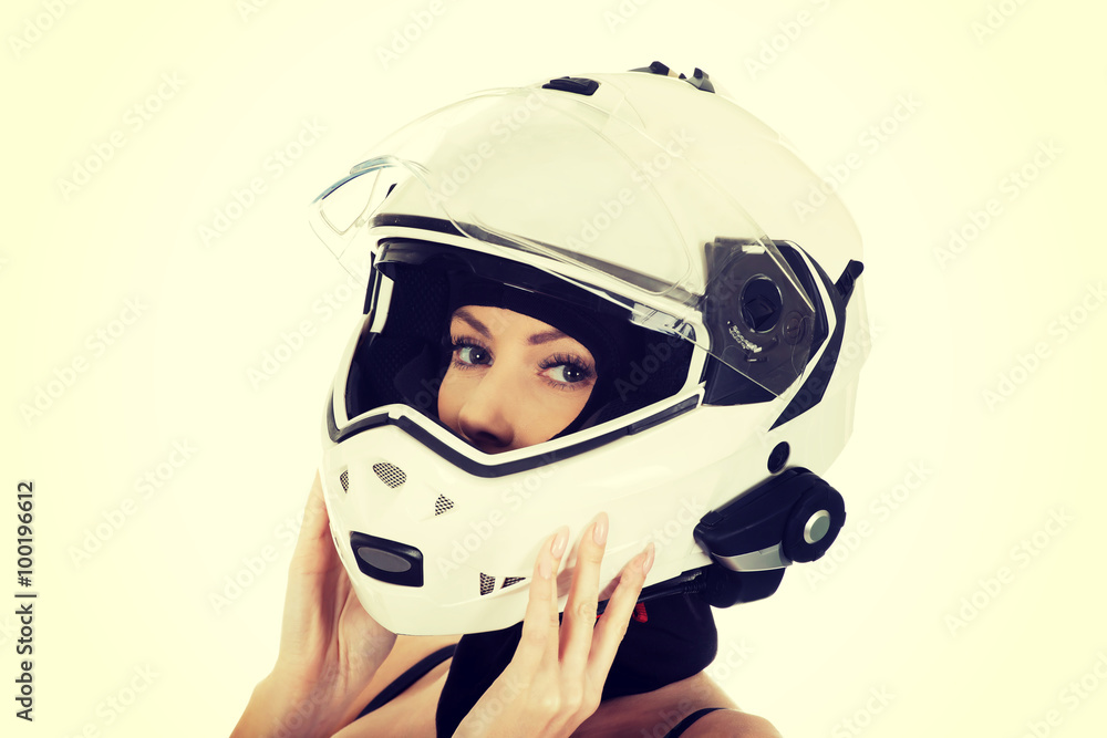 Sexy woman with motorcycle helmet.