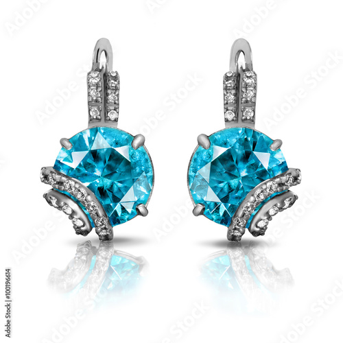 Jewelry. Silver earrings with diamonds and sapphires