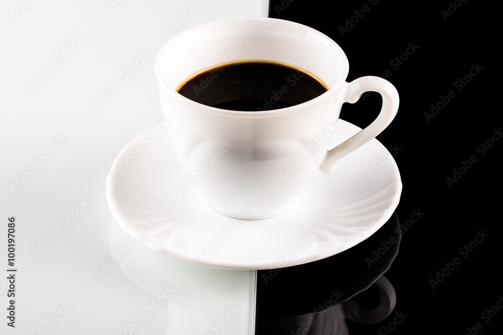 coffee cup on white and black background
coffee cup on white and black background