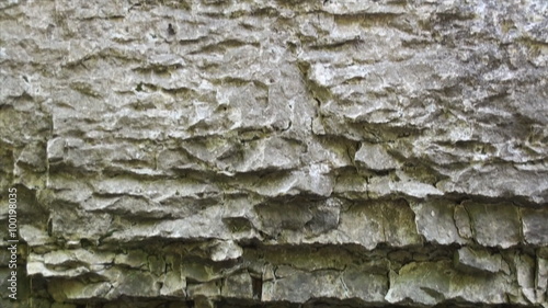 Rocky wall at the stream. photo