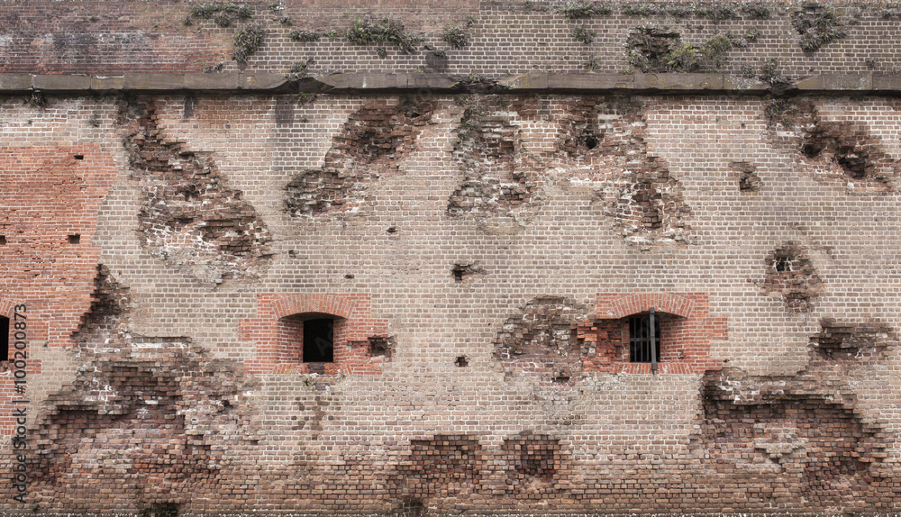 Bombarded brick wall