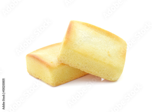 Photo Fruit cake squares on white background.