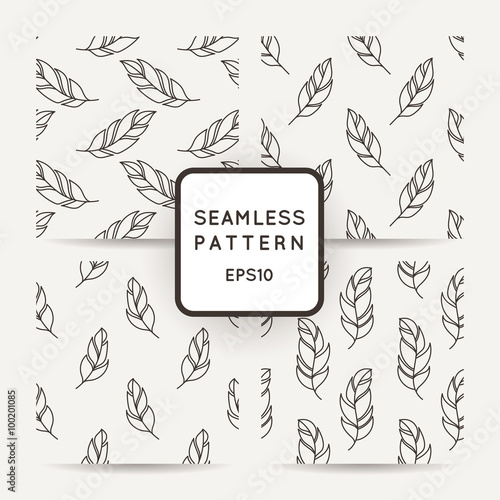 Set of vector seamless pattern of feathers. Doodle. Zentangle
