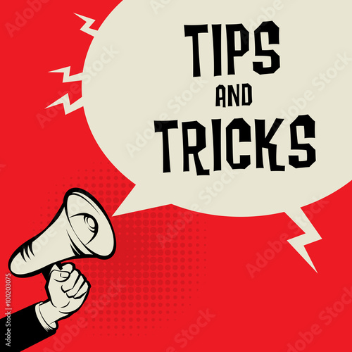 Megaphone Hand, business concept with text Tips and Tricks