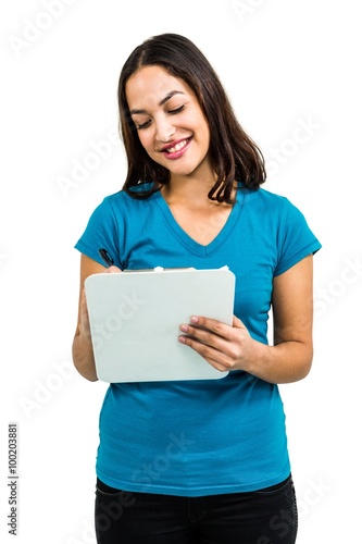 Woman holding digital tablet