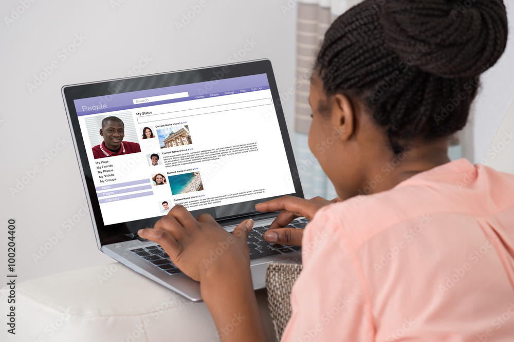 Woman Chatting On Social Networking Site Woman Chatting On Social Networking Site