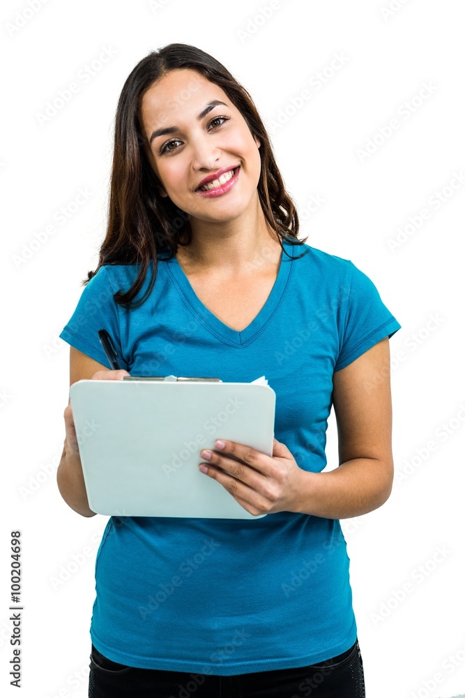 Portrait of beautiful woman writing in notepad Portrait of beautiful woman writing in notepad