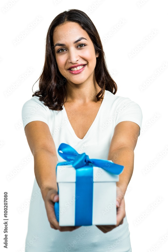 Portrait of young woman giving gift box Portrait of young woman giving gift box