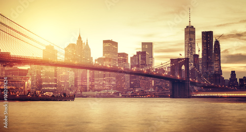 Retro stylized Manhattan at sunset, New York, USA.
