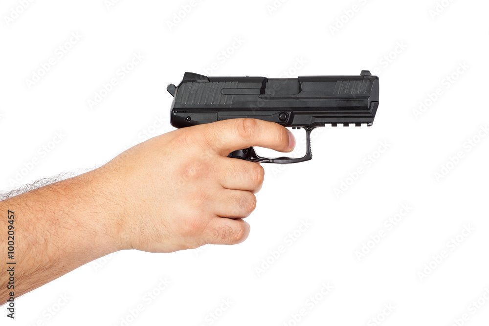 Gun in the hand isolated on white background Gun in the hand isolated on white background