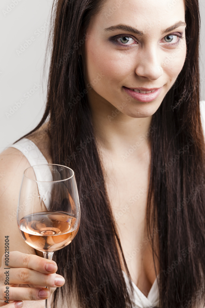 portrait of young woman with a glass of rose wine portrait of young woman with a glass of rose wine