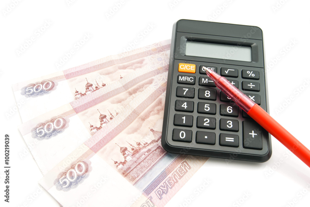 Russian banknotes, red pen and calculator Russian banknotes, red pen and calculator