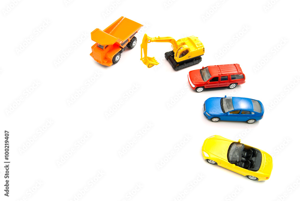 truck, yellow backhoe and cars