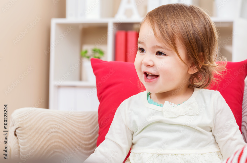 Happy toddler girl smiling in her house Happy toddler girl smiling in her house