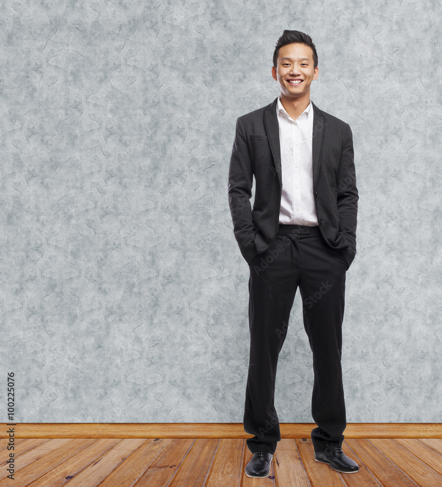 young asian business man smiling standing indoor young asian business man smiling standing indoor