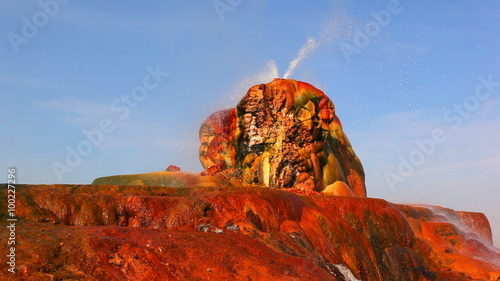 Shot of the colorful formations and hot water spouts at Fly Geyser, Nevada.