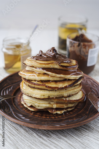 Pancakes with chocolate and honey