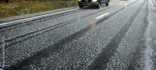Photography Hailstorm on the road in a summer day