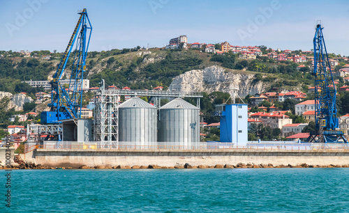 Cranes and tanks in Cargo terminal of Balchik port