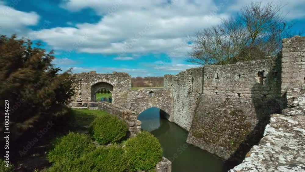 Time-lapse as clouds pass over an entrance to Leeds castle Time-lapse as clouds pass over an entrance to Leeds castle