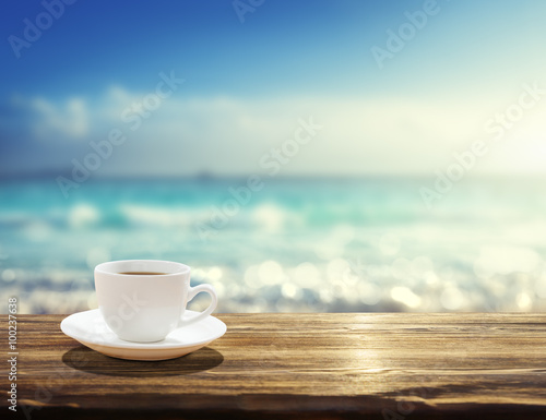 sea and cup of coffee