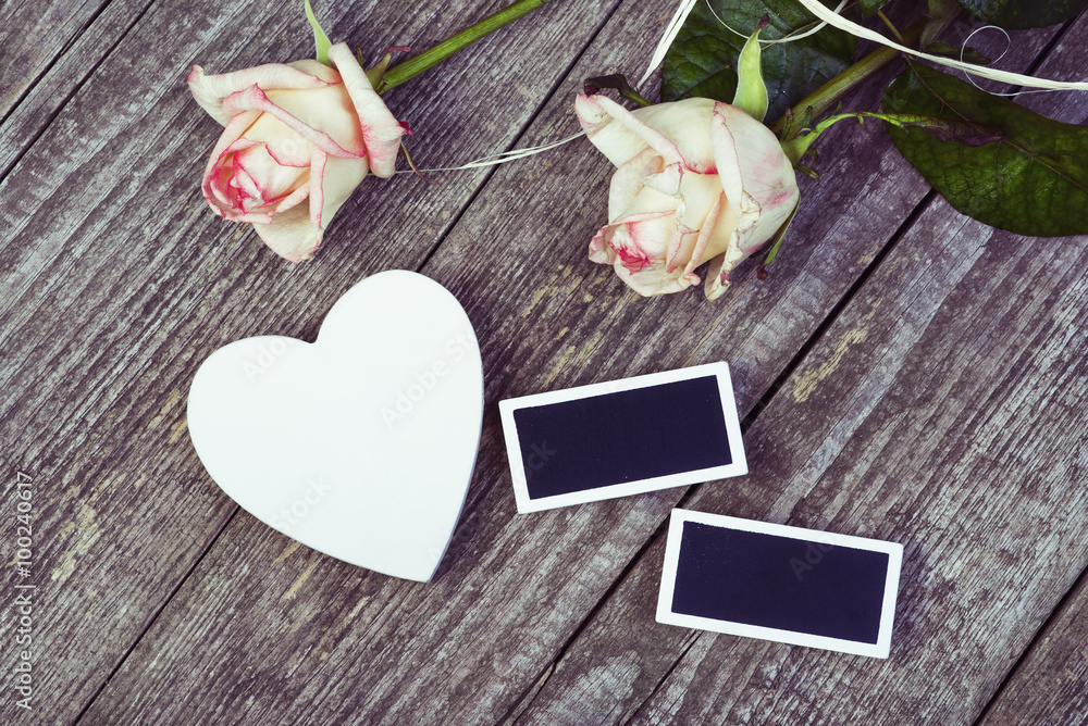White Wooden Heart, Two Small Blackboards And Beautiful Roses On Wooden Board. Love Concept.