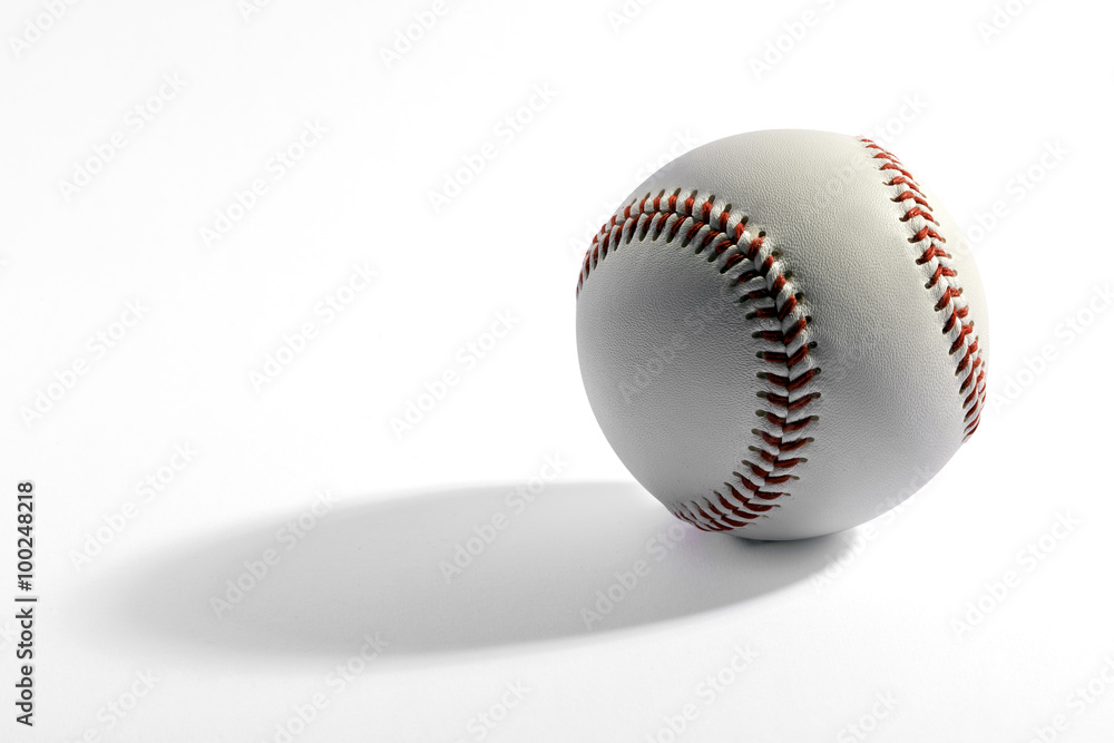 Baseball with long shadow Baseball with long shadow