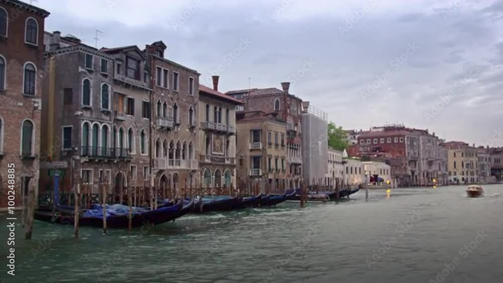 Motor boats, gondolas, and buildings of the Grand Canal. Motor boats, gondolas, and buildings of the Grand Canal.