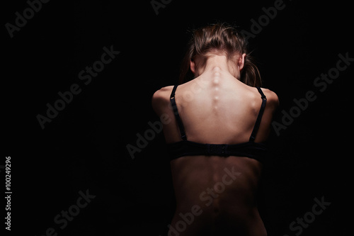 sadness young woman with naked back.sexy body girl